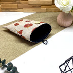 Doublure intérieure d'une pochette à livre de poche matelassée motif Ginkgo