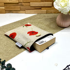 Pochette à livre de poche matelassée motif Coquelicot avec livre inséré