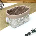 Panière de rangement textile artisanale à motif girafe et jungle tropicale, idéale pour organiser accessoires, cosmétiques ou lingettes lavables.